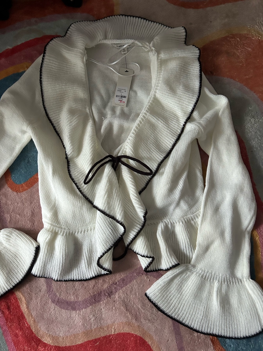 Ruffles white cardigan with black trim